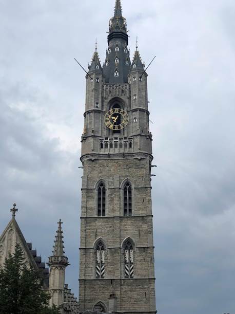 A clock on a tower

Description automatically generated with medium confidence